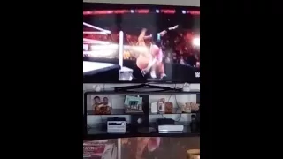 WWE XAVIER WOODS HADOUKEN ON AJ STYLES