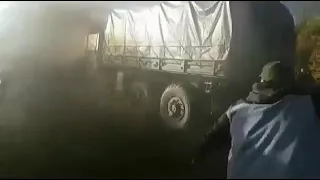Военный КрАЗ против трактора