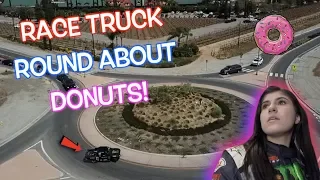 DONUTS AROUND A ROUND ABOUT IN A RACE TRUCK!!! Hailie Deegan!