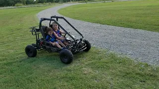 Grandkids having fun on Papa's new toy, 110cc GoCart