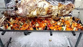 Welcome to Maya Braai and Spit Braai Catering.  whole lamb on spit braai with vegetables 😋