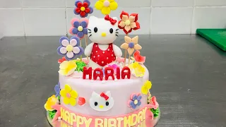 Hello kitty cake / fondant flowers cake