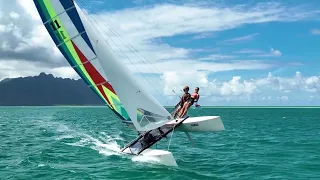 Three Hobie Cats racing around Hawai'i