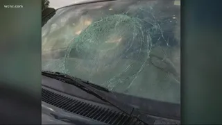 Union County authorities looking for suspect after object was thrown at car