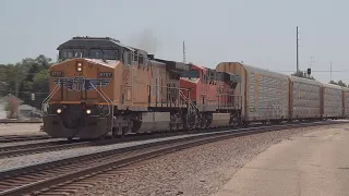 UP AC44 6757 leads an EB autorack through Streator, IL