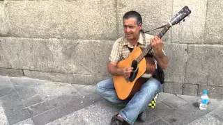 Madrid/Spain - Street Musician with a Guitar