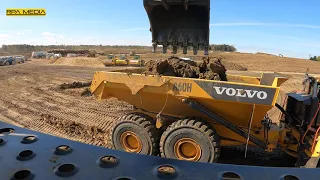 VOLVO EC950F loading A60H trucks