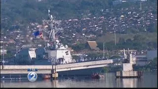 USS Halsey rendered pass-in-review honors to the USS Arizona