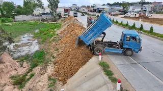 New project operator KOMATS'U D31P Dozer Pushing Stone & Soil with Dump Trucks Nissan 5ton