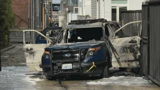 Man Throws Burning Torch Into Police Car With Cop Inside