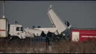 Wreckage, guards, at site of deadly Kazakh crash