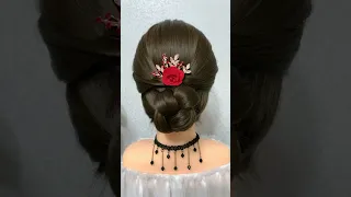 Very Beautiful Low Bun Hairstyle With Braids For Any Party