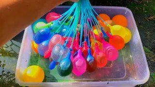 EXPERIMENT FILLING BALLOONS WITH WATER AND DYE