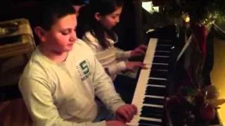 Sarah and Andrew Playing Piano