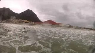 Jolynn catching a wave at Muizenberg beach South Africa