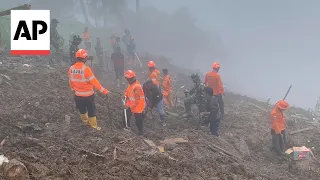 Rescuers find last 2 bodies in Indonesia's Sulawesi island landslide which killed 20