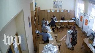 Watch: CCTV footage shows alleged ballot-stuffing in Russia elections