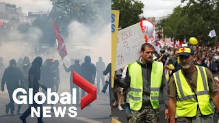 Bastille Day: Anti-government protesters face off with police in Paris