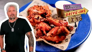 Guy Fieri Eats "Weird" Pizza & Wings in Memphis, TN | Diners, Drive-Ins and Dives | Food Network