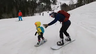 two year old snowboarder in big mountain burton after school