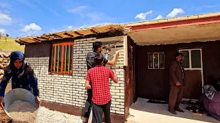 Creativity in painting🧱🎨. Mehdi paints the wall of the house with the help of Tahmourth  #family