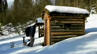 Hiding in an abandoned log cabin from a huge snowfall. 2 days in the shelter with puppy Rocky.