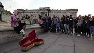 Justin Bieber and Hailey Baldwin busking at the Queen Victoria memorial near Buckingham palace