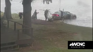 Suspect drives car into lake during police chase