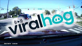 Red Light Runner Launched Into the Air After Accident || ViralHog