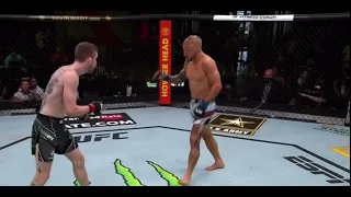 Cory sandhagen throws a flying knee at TJ Dillashaw and puts him in a triangle choke