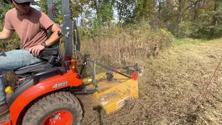 Brush hogging a dry detention basin with my Kubota BX23s