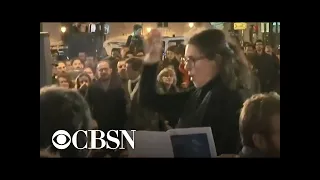 Parisians sing in honor of Notre Dame Cathedral after massive fire