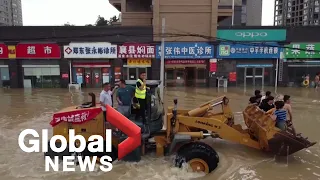 Drone footage shows rescue efforts in China's flood-stricken Henan province