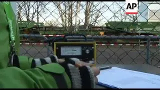 WRAP Nuclear waste train arrives, load transferred to truck, protest