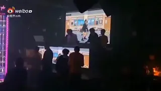 Lisa’s crab dance video played at a club in China