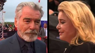 Deauville: P. Brosnan et C. Deneuve sur le tapis rouge | AFP Images