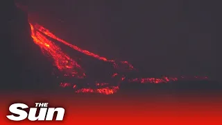 Lava pours from new La Palma volcano vent raising fears of more destruction