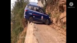 Car on mountain taking reverse on mountain #Dangerous driving by man #viral video