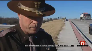 Semi Trucks Pull Under Tulsa Bridge To Help With Suicidal Man