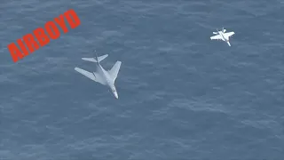 B-1 Bomber and F/A-18 Flyovers - Three-Carrier Strike Force