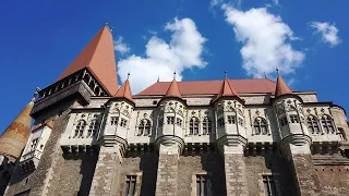 Outside the gothic Corvin Castle POV. Hunedoara, Romania