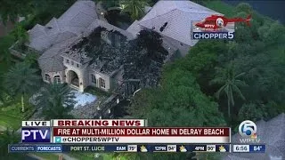 Large mansion gutted by fire in suburban Delray Beach