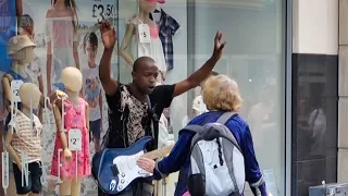 DISABLED WOMAN ATTACKS  BUSKER VERBALLY IN LIVERPOOL.  The people of Liverpool support this busker.