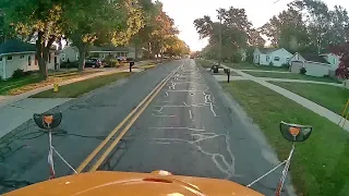 Full video: Heroic rescue of baby caught on school bus camera