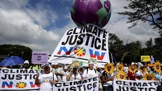 Thousands march ahead of climate summit