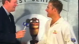 Tony Greig gives Shane Warne Man of the Match award