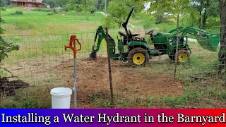 Installing a Water Hydrant in the Barn Yard with a John Deere 2025