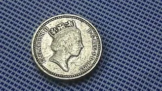 one pound 1993 royal arms coin from United Kingdom queen Elizabeth coin value