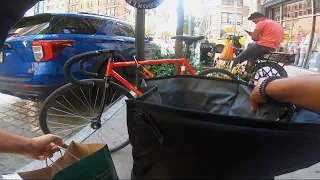 Ubers eats bike messenger in New York during pandemic.