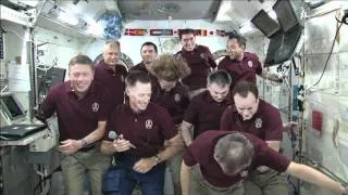 Shuttle, Station Crews in Joint News Conference